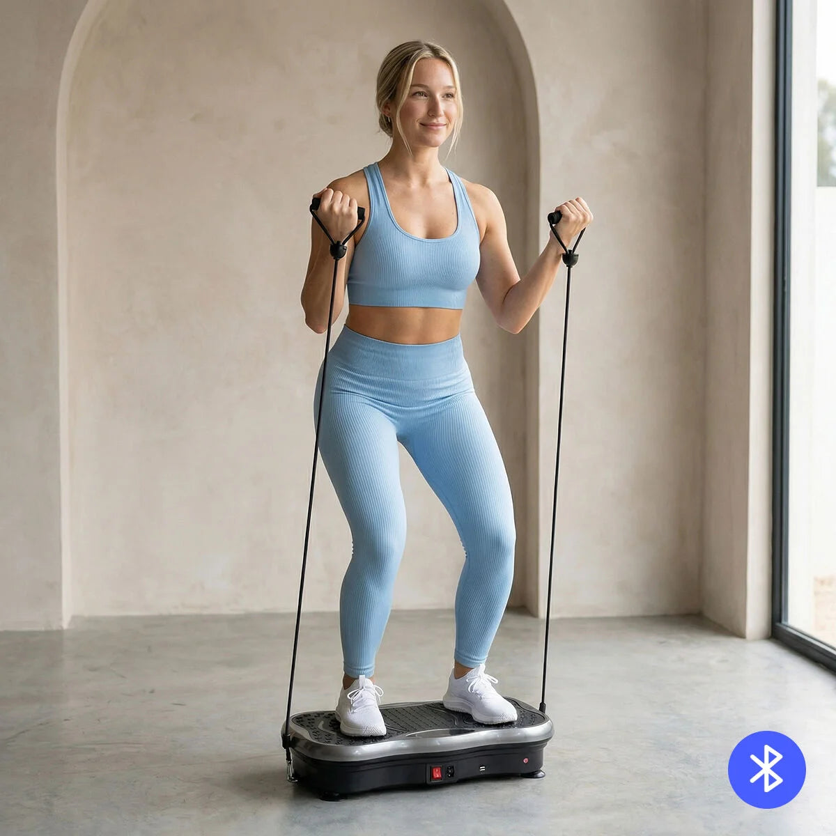 Vivflow Vibrationsplattform mit Widerstandsbändern bei einer stehenden Übung